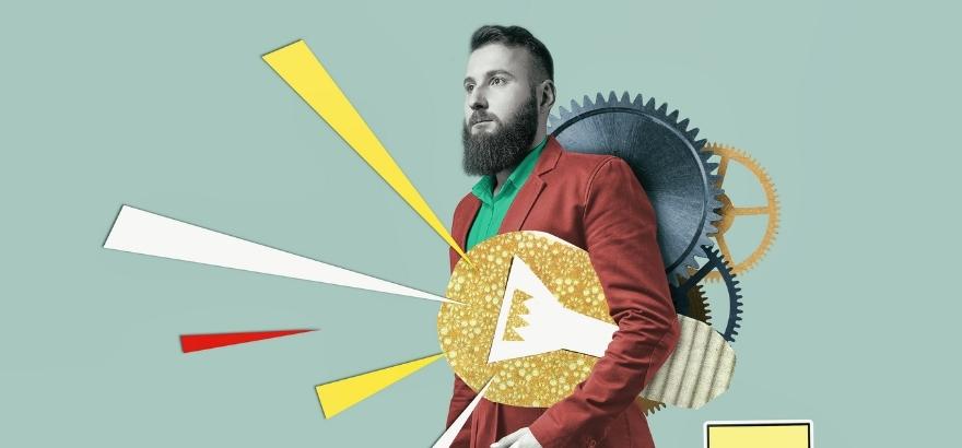 Man holding a bright paper light bulb signifying brand strategy ideas